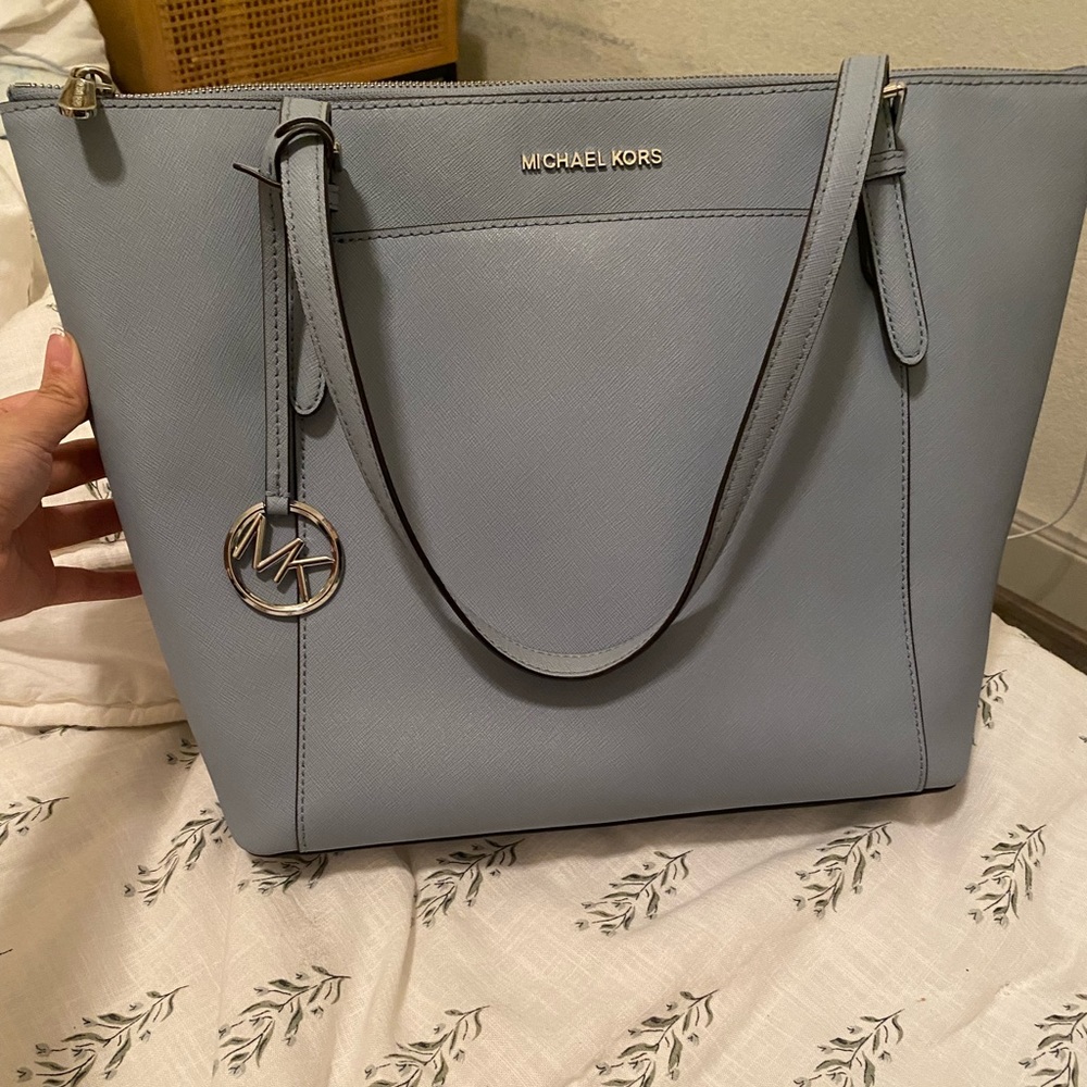 Michael Kors Pale blue tote with silver accents.